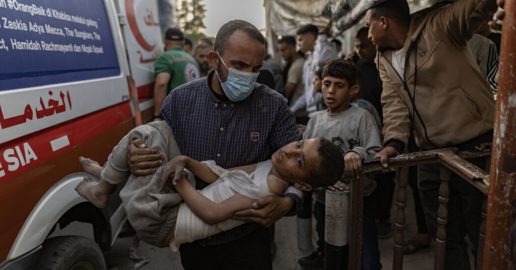 Israeli Strike Kills Dozens at Gaza City Shelter, Officials Say
